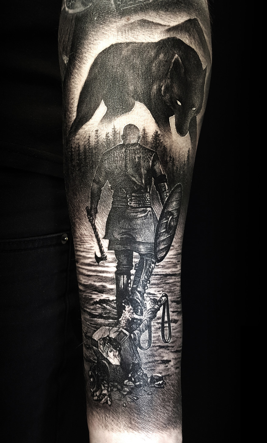 Tattoo-Anansi-Studio-Munchen-Munich-Haidhausen-Alex-Vikings-series-Ragnar-Lothbrok-movie-character-axe-and-shield-shieldwall-forest-nature-nordic-best-balck-and-grey-realism.jpg