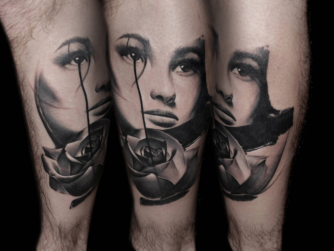 Tattoo-Anansi-Studio-Munchen-Munich-Haidhausen-Alex-leg-calves-face-woman-girl-beauty-rose-filigran-best-black-and-grey-realistic-portrait.jpg